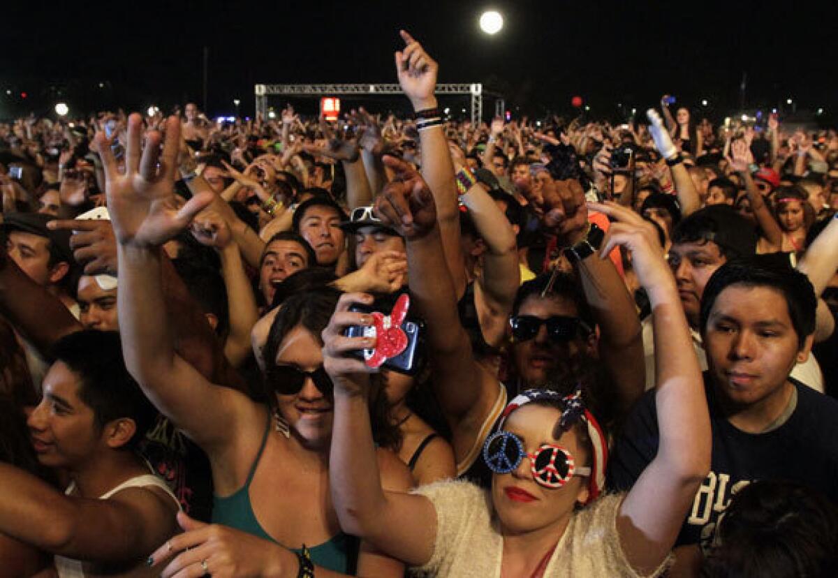 Fans capture the moment and more during Nero's set at the HARD Summer Music Festival on Saturday at L.A. State Historic Park downtown.