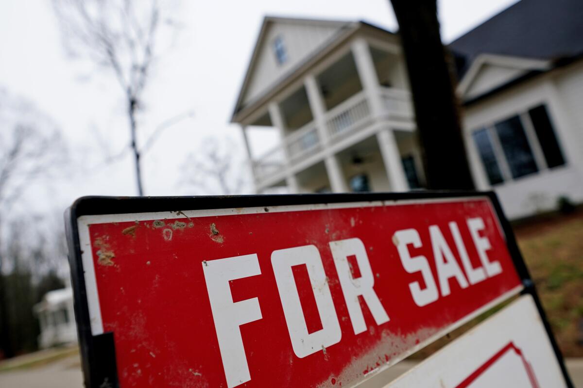 FILE - In this Thursday, Feb. 18, 2021, file photo, a new home is for sale in Madison, Ga. Mortgage buyer Freddie Mac reported Thursday, July 14, 2022, that the 30-year rate rose to 5.51% from 5.30% last week, just as the latest government data shows inflation has not slowed, meaning the Federal Reserve is almost certain to raise its benchmark borrowing rate again. (AP Photo/John Bazemore, File)