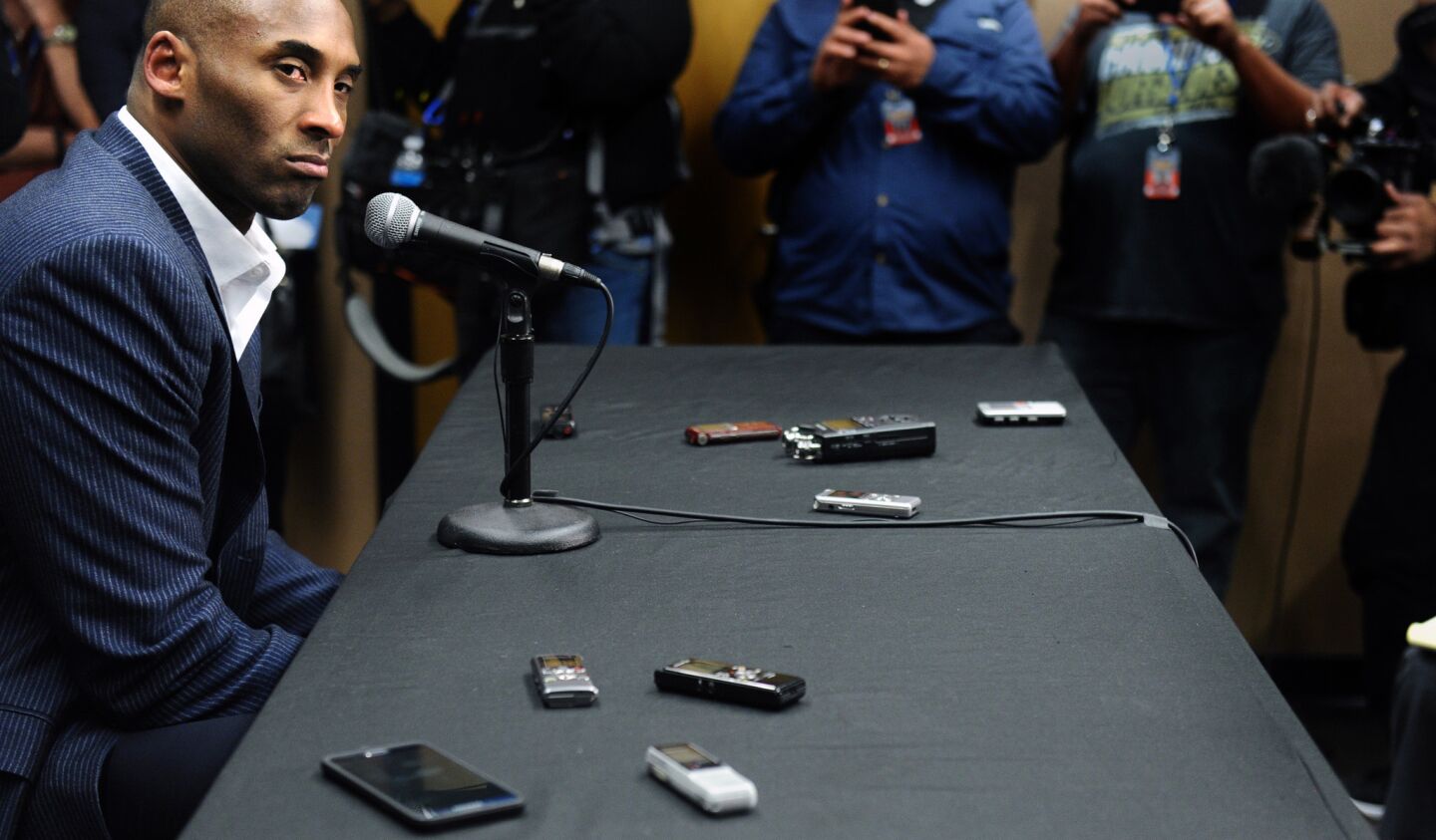 Kobe Bryant listens to a reporter askhim if he will "shut it down" because of his injured right shoulder during a news conference in Denver on March 2, 2016. Bryant only played in the first half of a 117-107 loss to the Nuggets.