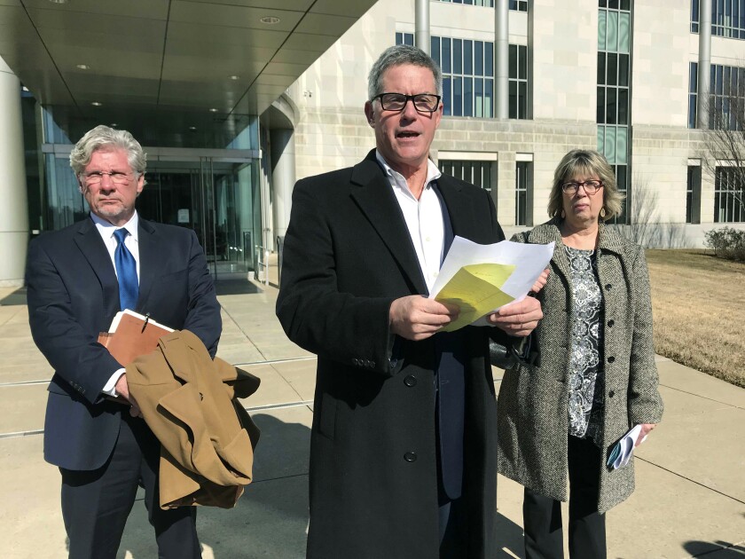 FILE - In this Jan. 24, 2019 file photo, former state Sen. Gilbert Baker speaks to reporters outside the federal courthouse in Little Rock, Ark. A federal jury on Thursday, Aug. 12, 2021, acquitted the former lawmaker of conspiring to bribe an ex-judge who admitted to lowering a jury's award in a negligence lawsuit in exchange for campaign contributions. (AP Photo/Andrew DeMillo, File)