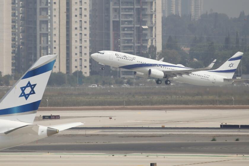 Israeli flag carrier El Al's airliner which is carrying Israeli and U.S. delegations to Abu Dhabi for talks meant to put final touches on the normalization deal between the United Arab Emirates and Israel, takes off at Ben Gurion Airport, near Tel Aviv, Israel Monday, Aug. 31, 2020. (AP Photo/Ariel Schalit)