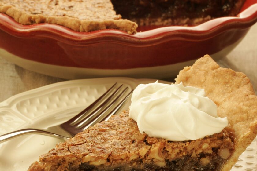 This starts with a pecan pie-like custard base, but instead of going with the more traditional nut, walnuts and raisins fold into the filling. Try it.