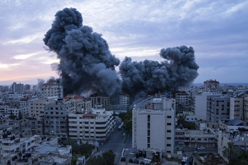 Smoke rises following an Israeli airstrike, in Gaza City, Saturday, Oct. 7, 2023. The militant Hamas rulers of the Gaza Strip carried out an unprecedented, multi-front attack on Israel at daybreak Saturday, firing thousands of rockets as dozens of Hamas fighters infiltrated the heavily fortified border in several locations by air, land, and sea, killing dozens and stunning the country. Palestinian health officials reported scores of deaths from Israeli airstrikes in Gaza. (AP Photo/Fatima Shbair)