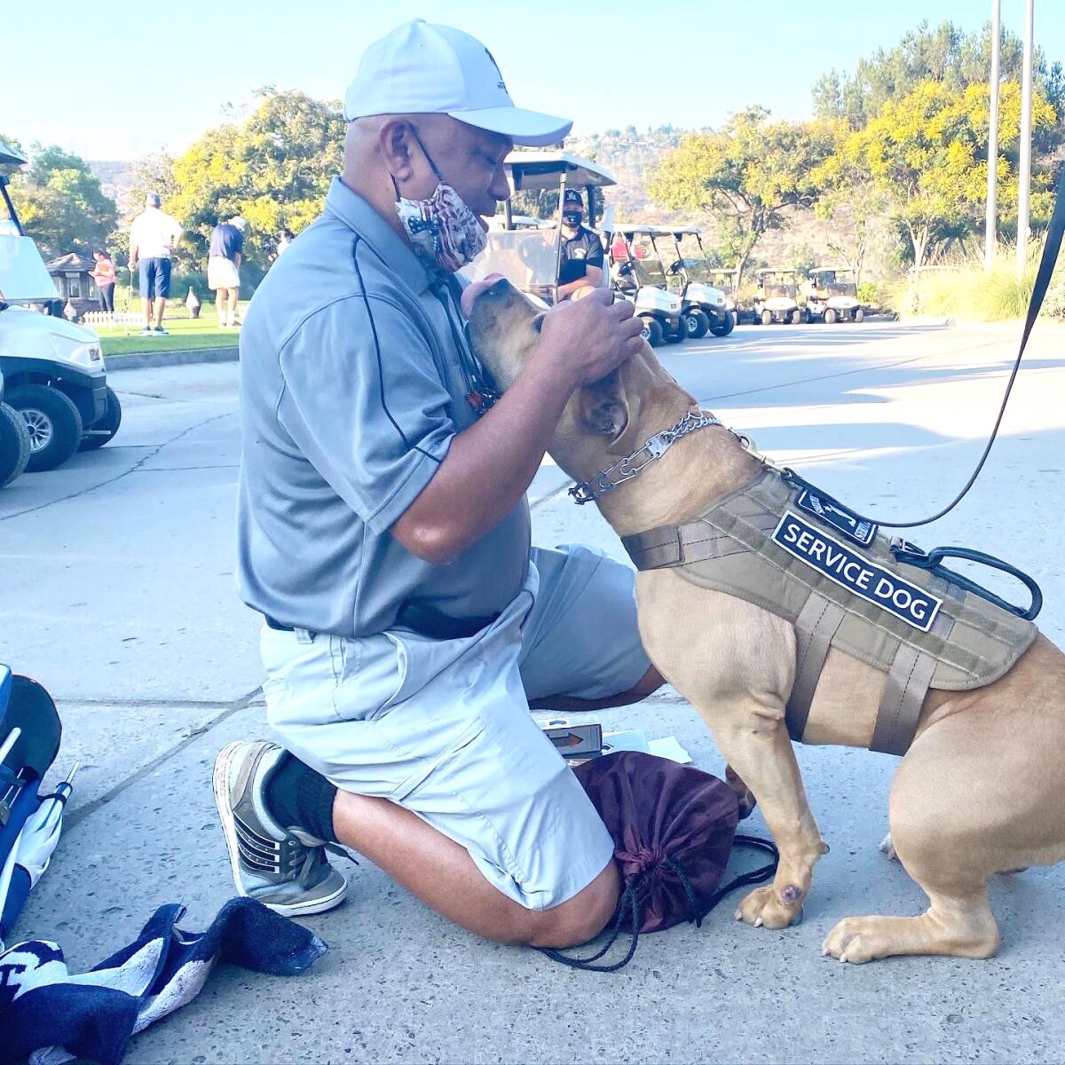 Lito Bautista (US Navy Ret.) with STS Service Dog Halia