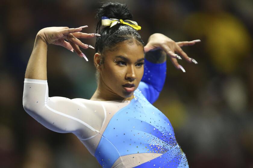 FILE - UCLA's Jordan Chiles competes on the floor exercise during an NCAA gymnastics.
