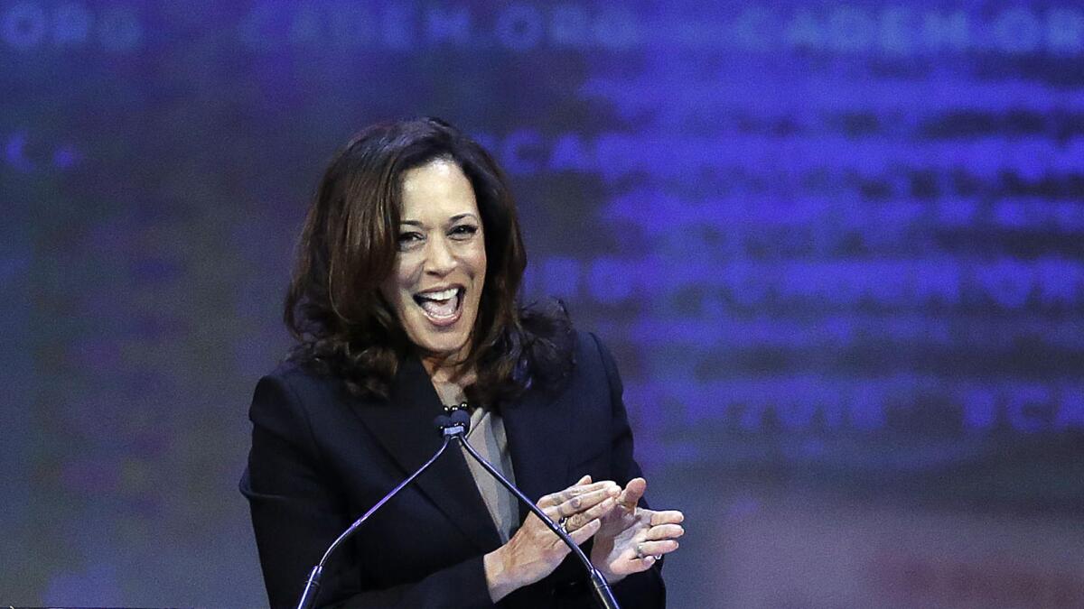Atty. Gen. Kamala Harris applauds at the California Democratic Party convention in San Jose in February.