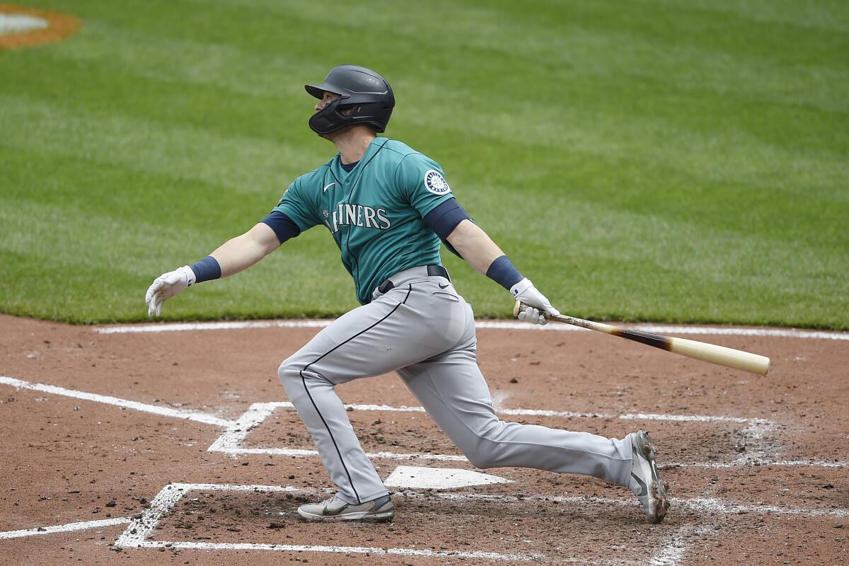 Ken Griffey Jr. follows through on a seventh-inning double in