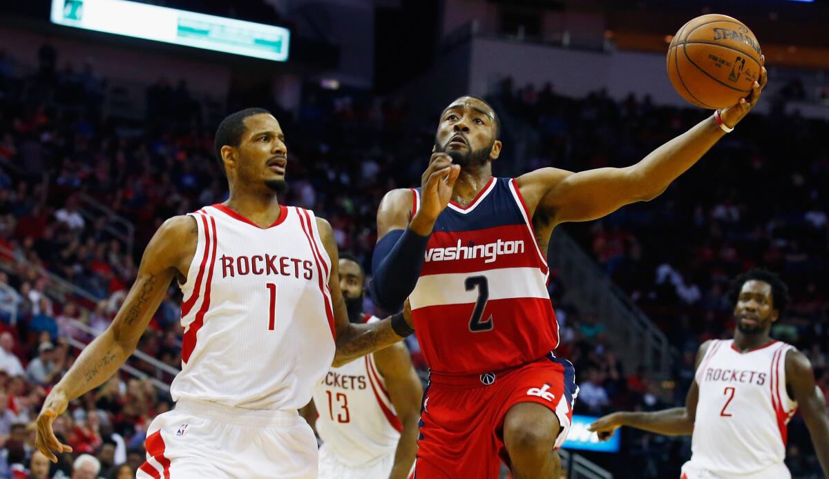 John Wall had 19 points with 13 assists in the Wizards' 123-122 victory over the Rockets on Jan. 30.