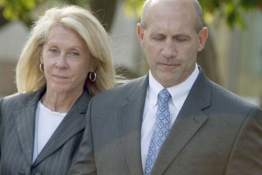 Mike and Deborah Carona were more somber leaving the Santa Ana courthouse Monday. The had judge chastised their "unrestrained celebration and proclamations of innocence" after Januarys mixed verdict.
