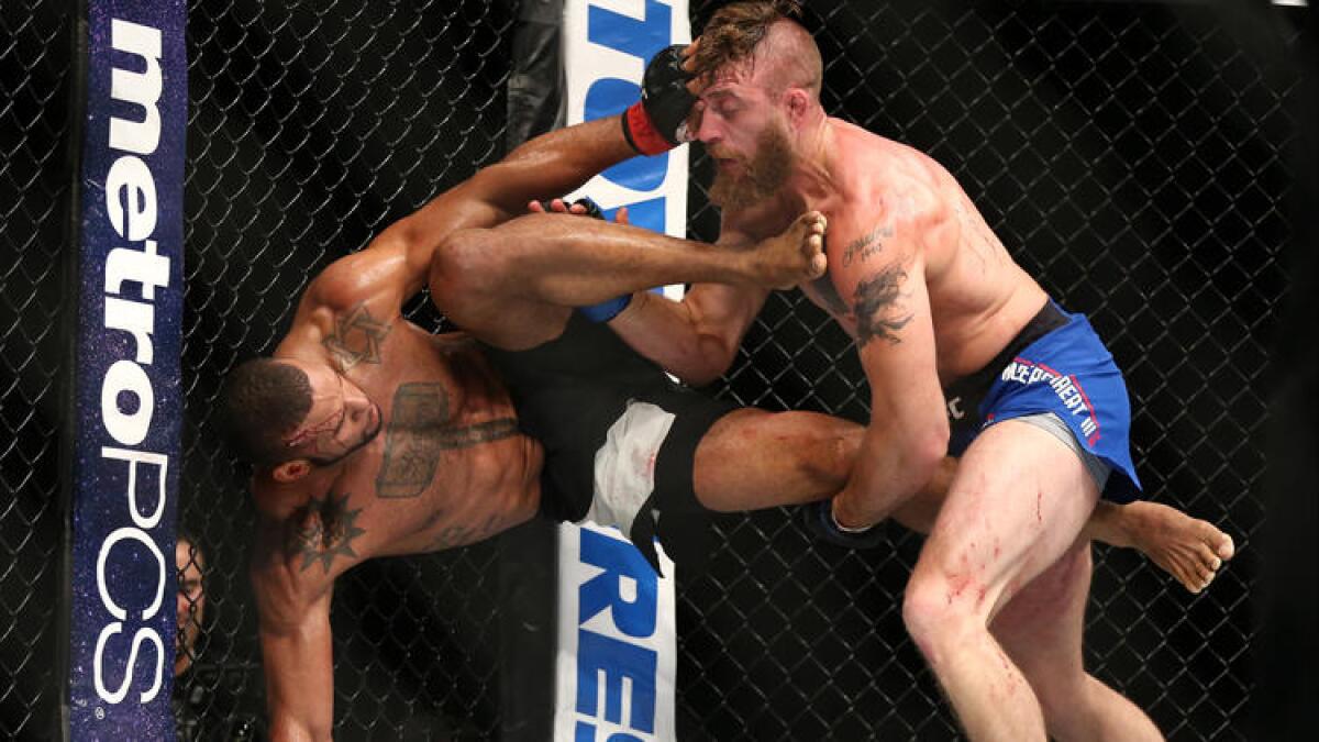 Gerald Meerschaert takes down Thiago Santos during their middleweight fight at UFC 213.