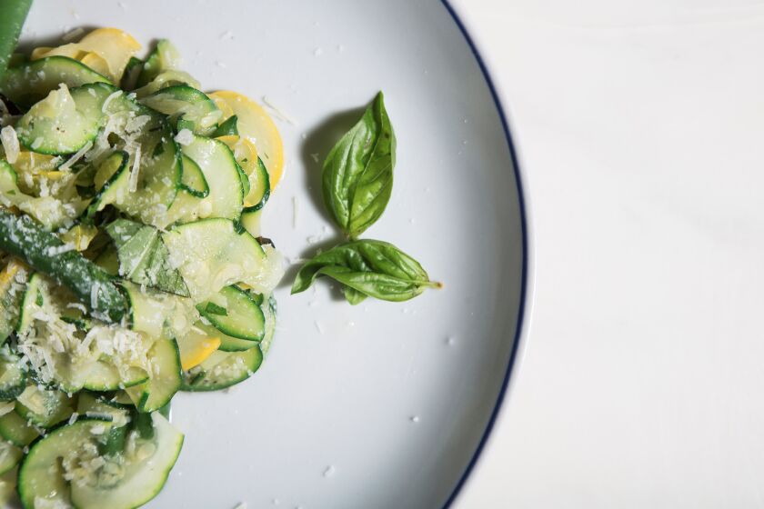 Summer squash pasta with greens and fresh herbs.