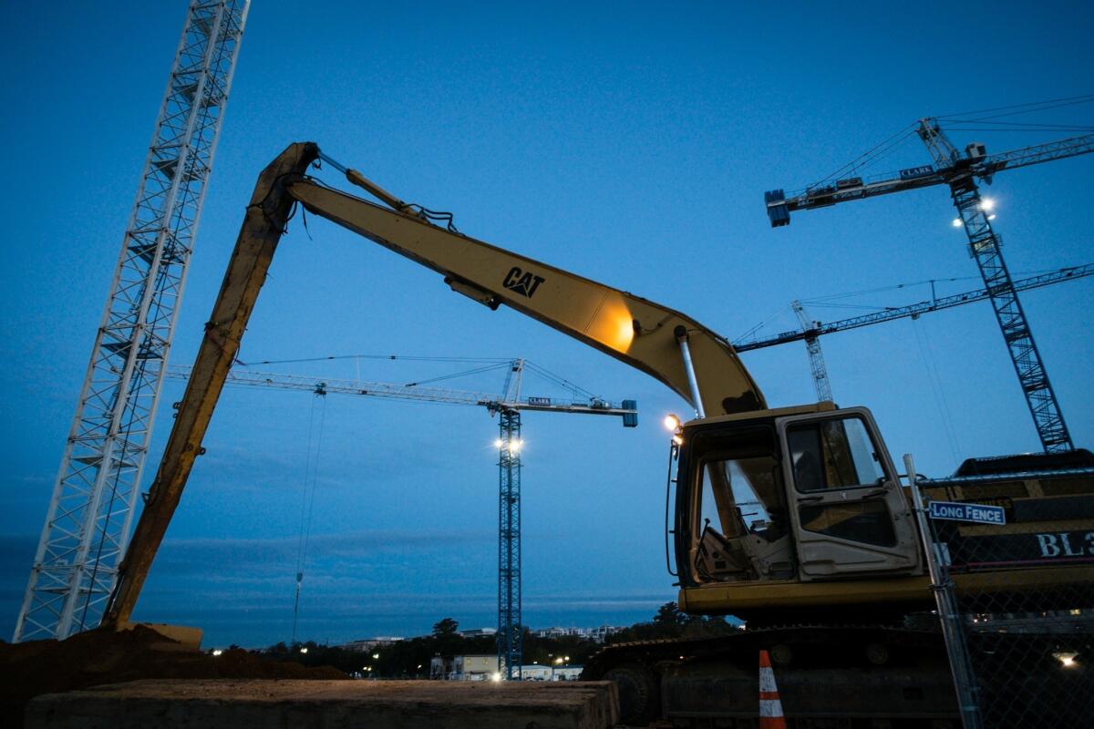 Construction spending rose 0.8% in October, the U.S. Census Bureau said Monday. Above, heavy equipment at the site of a new Smithsonian museum in Washington.