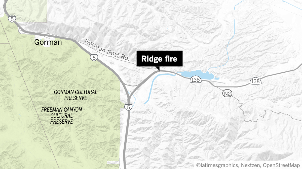 Firefighters were working to contain the 200-acre Ridge fire Monday afternoon.