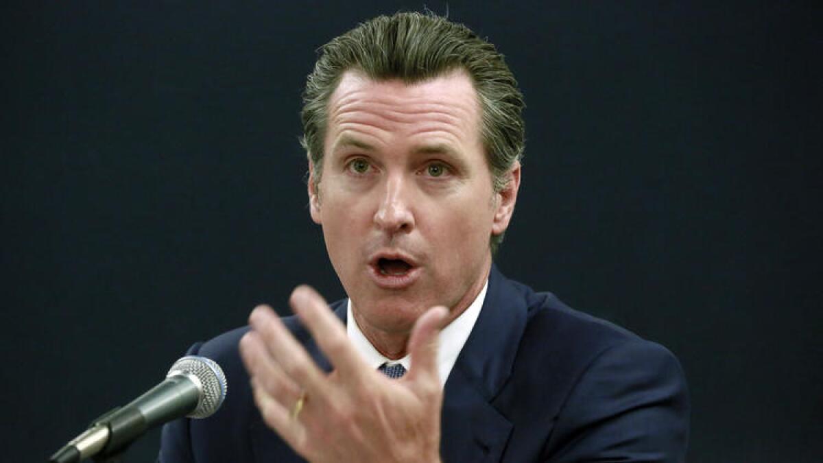 California Lt. Gov. Gavin Newsom, pictured at a forum in April, will announce a new ballot initiative to strengthen the state's gun laws,