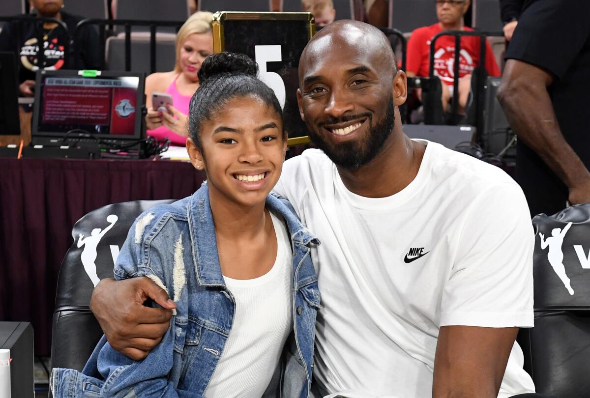 Gianna Bryant and her father, basketball great Kobe Bryant, attend the 2019 WNBA All-Star Game at the Mandalay Bay Events Center in Las Vegas.