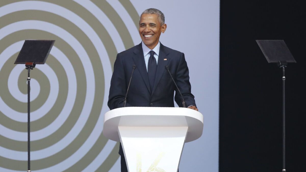 Former President Obama speaks at the Nelson Mandela Annual Lecture at the Wanderers Stadium in Johannesburg, South Africa, on July 17, 2018.