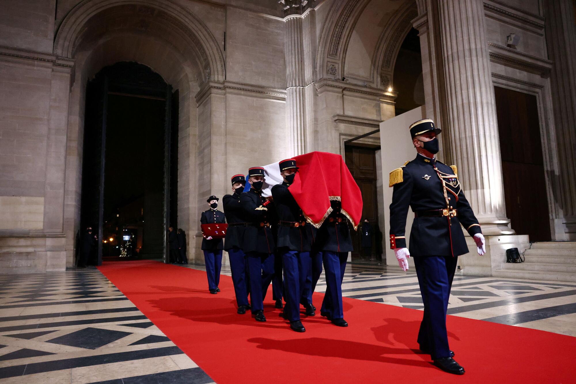 French soldiers carry a cenotaph during a ceremony dedicated to Josephine Baker
