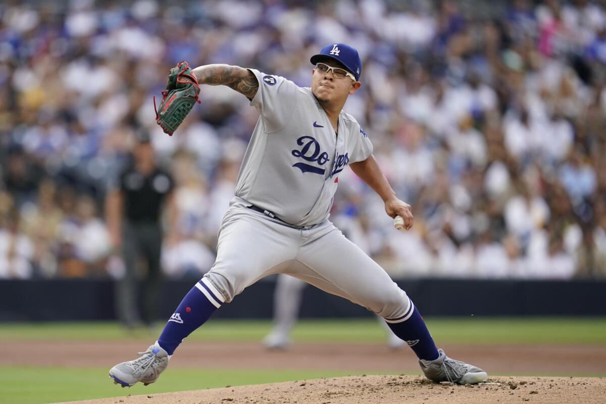 Dodgers starting pitcher Julio Urías delivers during the first inning against the San Diego Padres on Saturday.