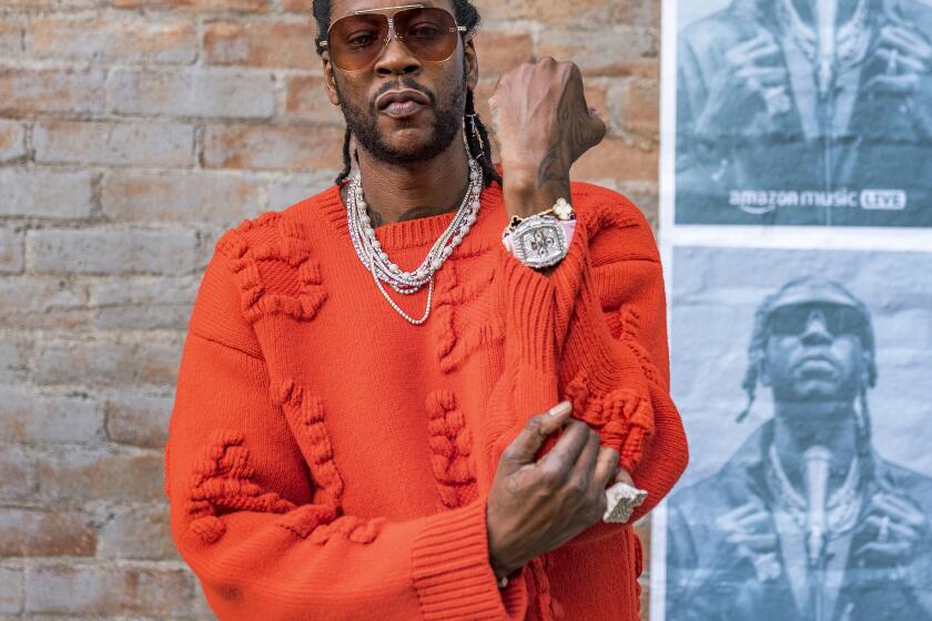 FILE - Grammy-winning rapper 2 Chainz poses for a portrait in Los Angeles on Nov. 4, 2022. 2 Chainz says his official studio album with Lil Wayne, expectedly titled “COLLEGROVE 2,” will be out before 2023 is over. (AP Photo/Damian Dovarganes)