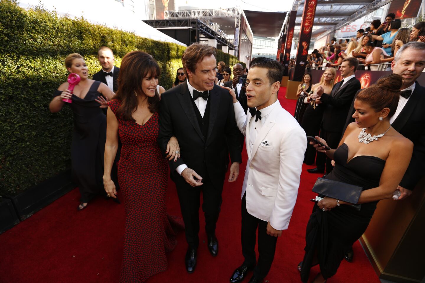 (L-R) Kelly Preston, John Travolta and Rami Malek.