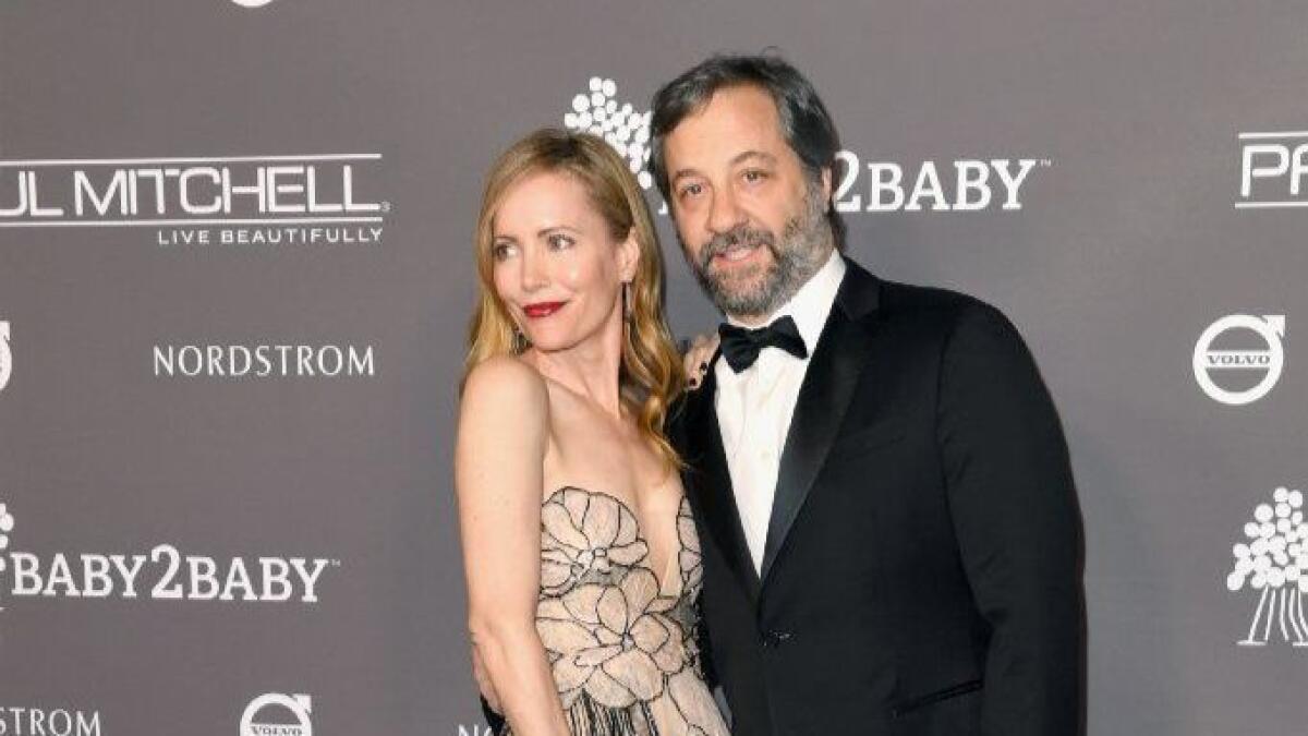 Actress Leslie Mann and filmmaker Judd Apatow have paid $14.5 million for a Santa Monica penthouse. The residence, located in a building where Hollywood great William Holden once lived, had been listed for $15 million.