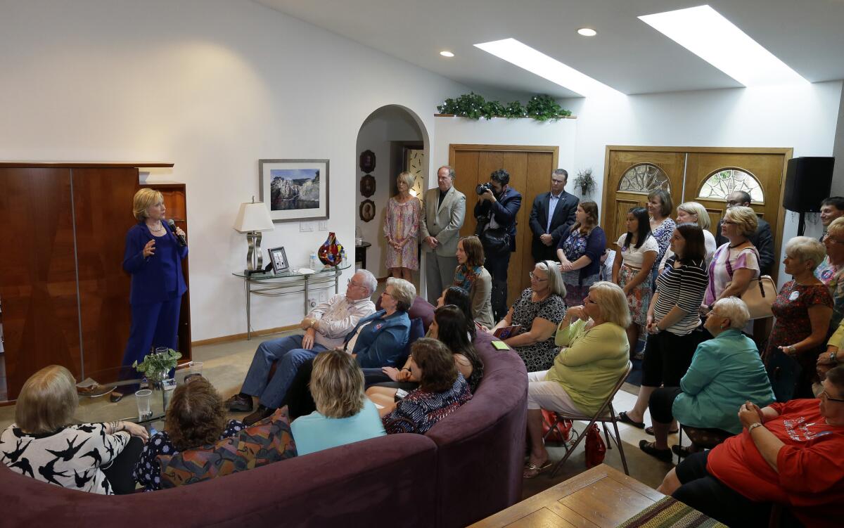 Democratic presidential candidate Hillary Rodham Clinton speaks during a house party in Ottumwa, Iowa. The campaign has used such events to recruit volunteers and collect email addresses and other information about supporters.