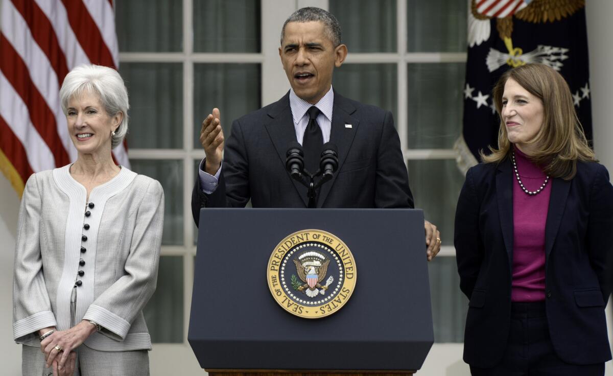 President Obama is shown in April, flanked by outgoing Health and Human Services Secretary Kathleen Sebelius, left, and Sylvia Mathews Burwell, who was confirmed June 5 to replace Sebelius.