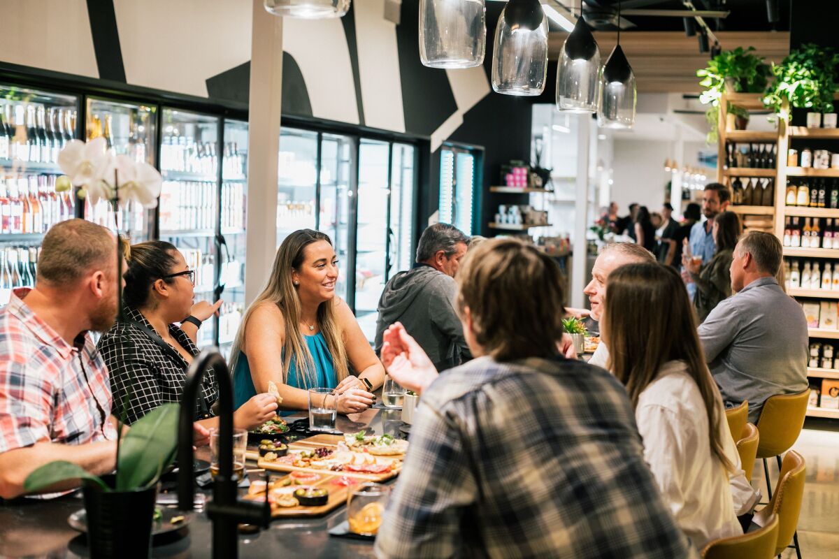 Guests enjoy the new MRKT Space.