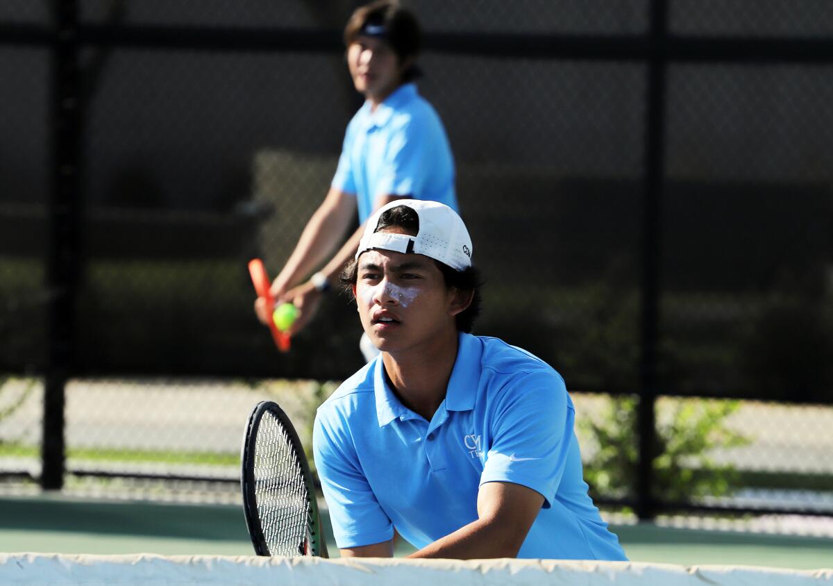 CdM's No. 2 doubles team of Brody Jao and Tristan Pham competes against University during Friday's CIF title match.