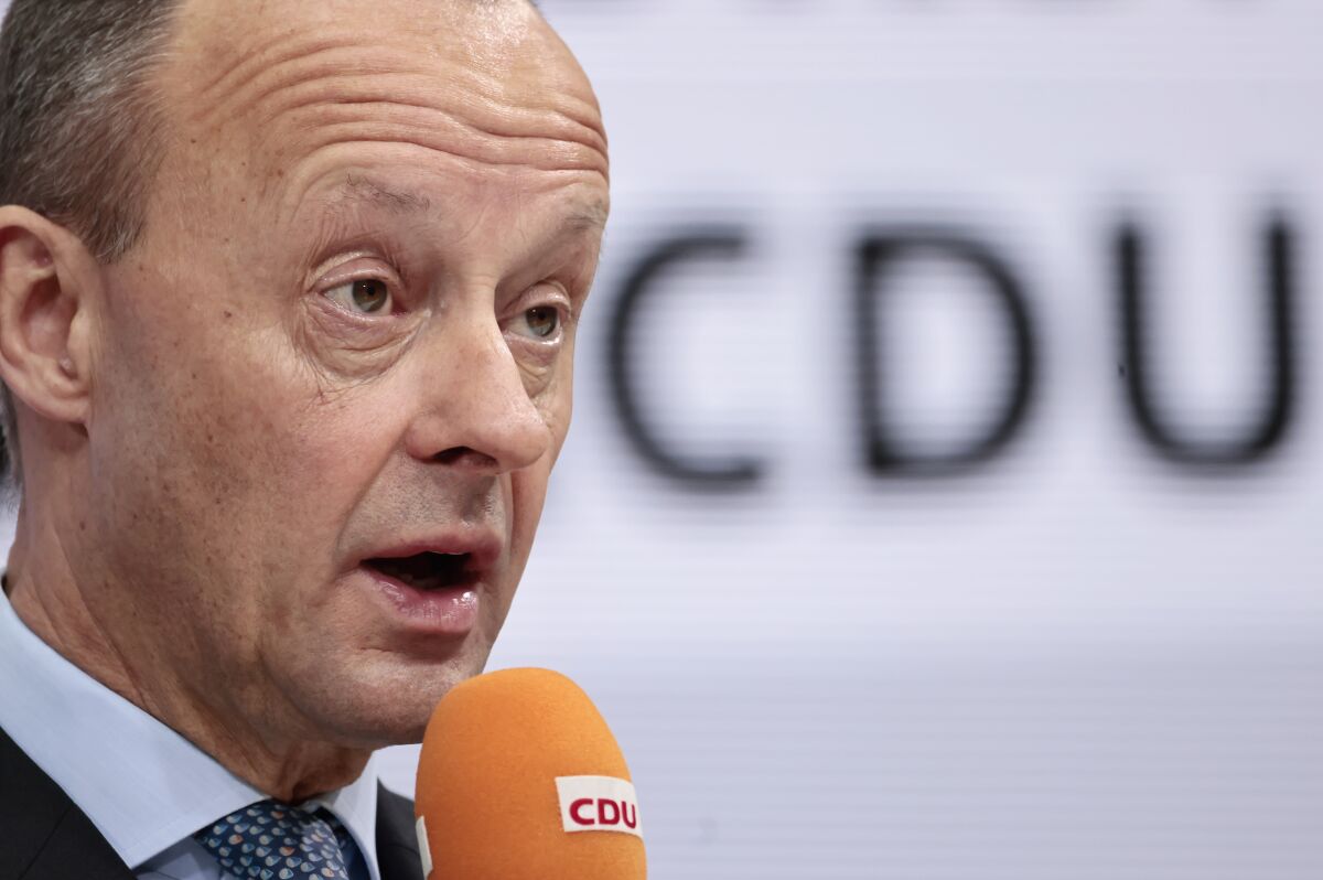 Christian Democratic Party (CDU) Chairman Friedrich Merz speaks at a news conference at the party's headquarters in Berlin, Germany, Jan. 31, 2022. Friedrich Merz formally took over on Monday as the leader of Germany's main opposition party, the center-right Christian Democratic Union of ex-Chancellor Angela Merkel, after his position was endorsed by a postal ballot. (Hannibal Hanschke/Pool Photo via AP)
