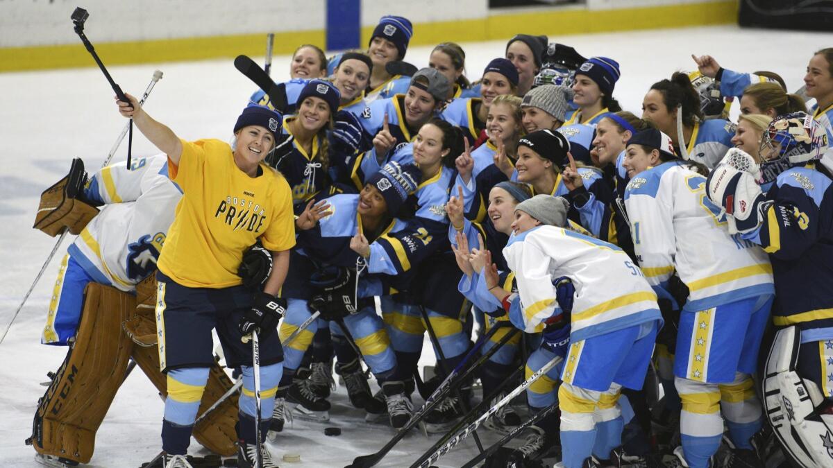 National Women's Hockey League All-Star players pose for a selfie Jan. 24, 2016, in Buffalo, N.Y.