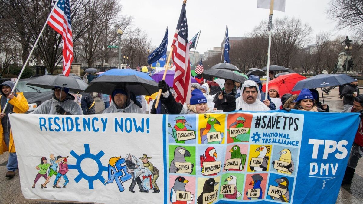 Demonstrators in Washington last month urge Congress to enact permanent protections for recipients of temporary protected status, or TPS.