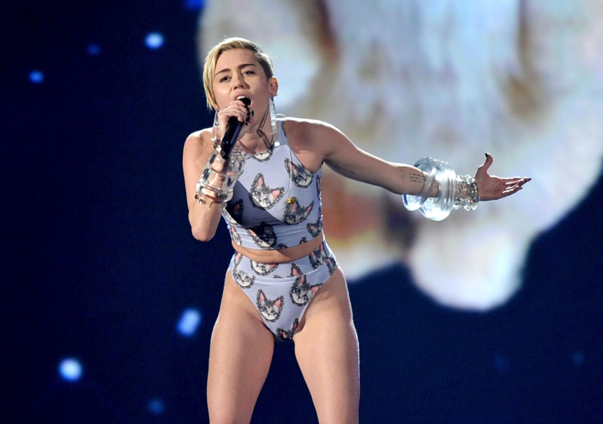 Miley Cyrus performs at the American Music Awards.
