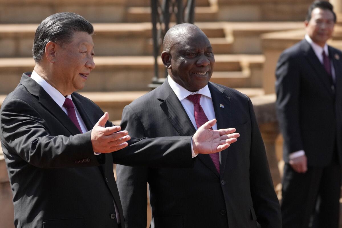 Chinese President Xi Jinping, left, and South African President Cyril Ramaphosa
