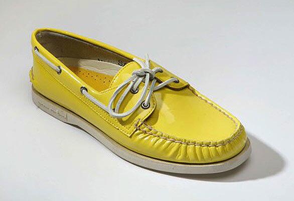 A yellow, Sperry Topsider shoe.