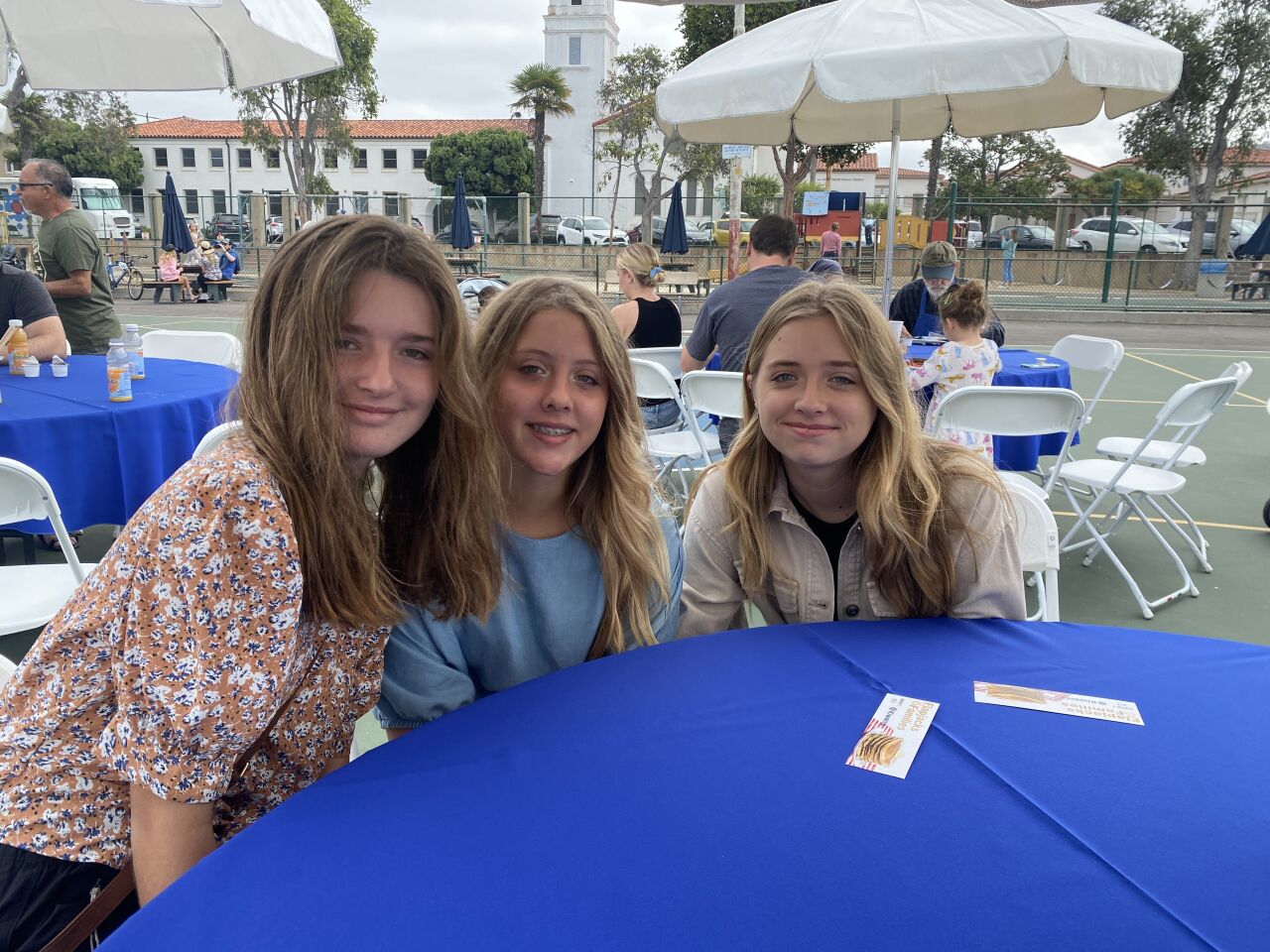 Muirlands Middle School students Eliza Gordon and Camille and Celeste Peters (from left) turn out for the Kiwanis Club of La Jolla's annual pancake breakfast.