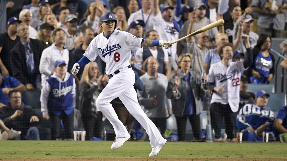 Manny Machado watches a single fall against the Red Sox during Game 3 of the World Series.