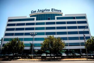 The new sign on top of the new Los Angeles Times headquarters in El Segundo, Calif., June 28, 2018.