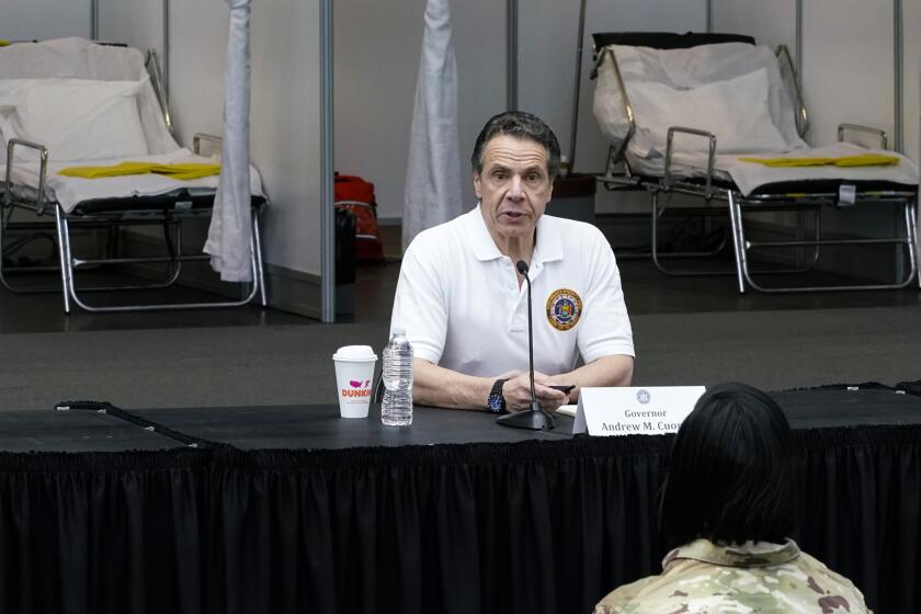 NEW YORK, NY - MARCH 27: New York Gov Andrew Cuomo gives a daily coronavirus press conference in front of media and National Guard members at the Jacob K. Javits Convention Center, which is being turned into a hospital to help fight coronavirus cases on March 27, 2020 in New York City. Cuomo will be requesting authorization for four additional hospital sites amid COVID-19 coronavirus outbreak. (Photo by Eduardo Munoz Alvarez/Getty Images)
