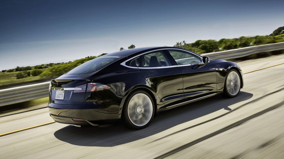 The 2013 Tesla Model S. The company is recalling all Model S cars built before April 2016.