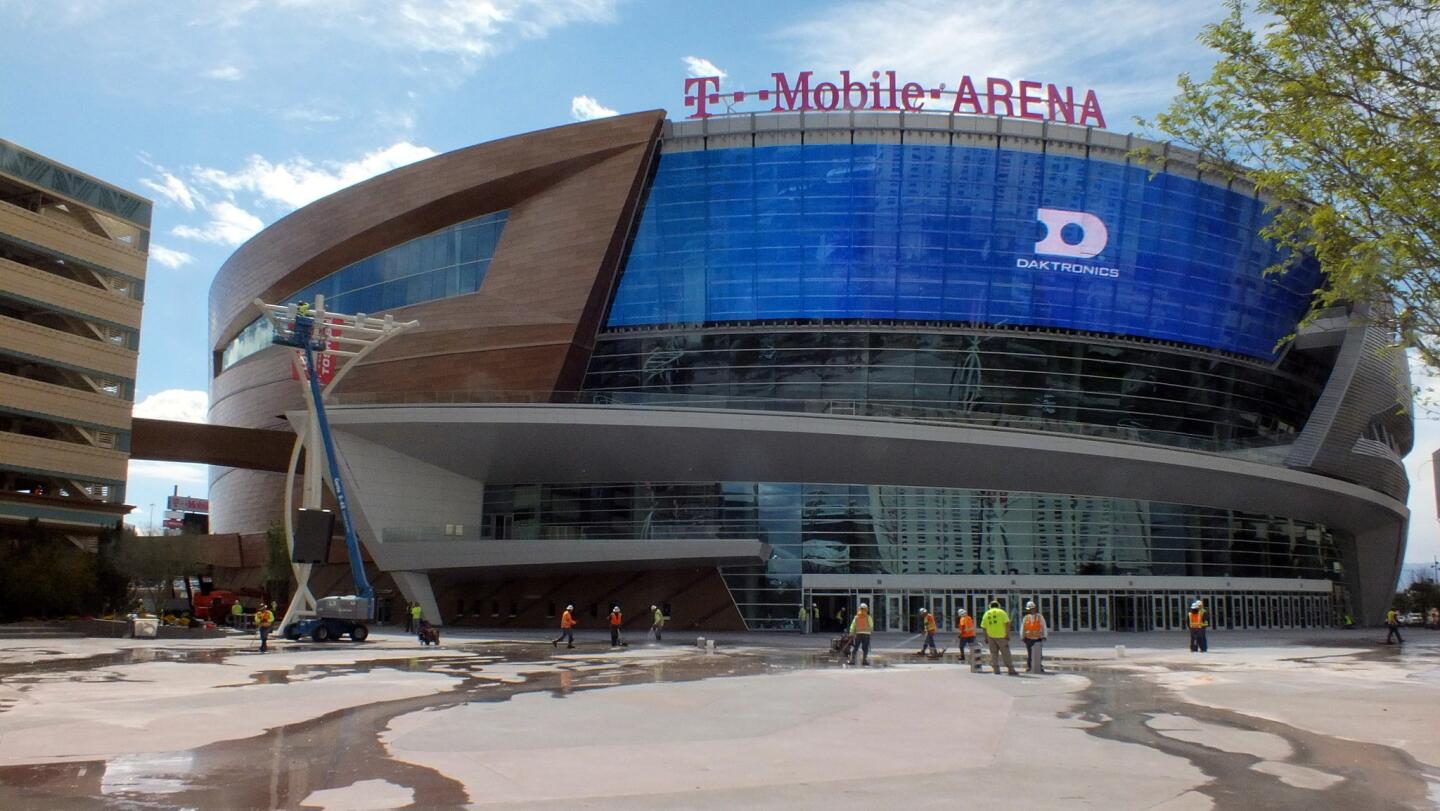 Workers put the finishing touches on T-Mobile Arena last week in preparation for its grand opening on Wednesday.