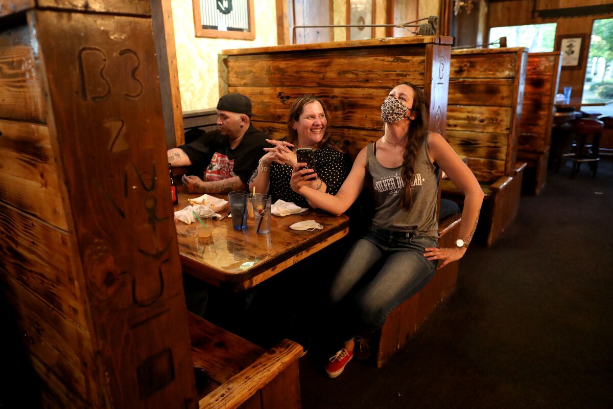 Jeremiah Pino, Lydia Perez, Aimee Roux at Silver Dollar Saloon in Marysville, Calif.