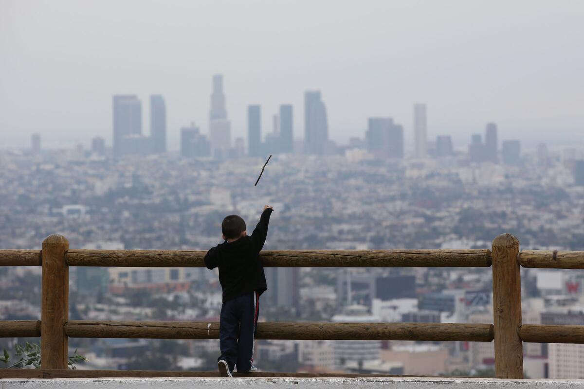 The view from the Hollywood Bowl overlook on Wednesday shows gray skies enveloping downtown Los Angeles.
