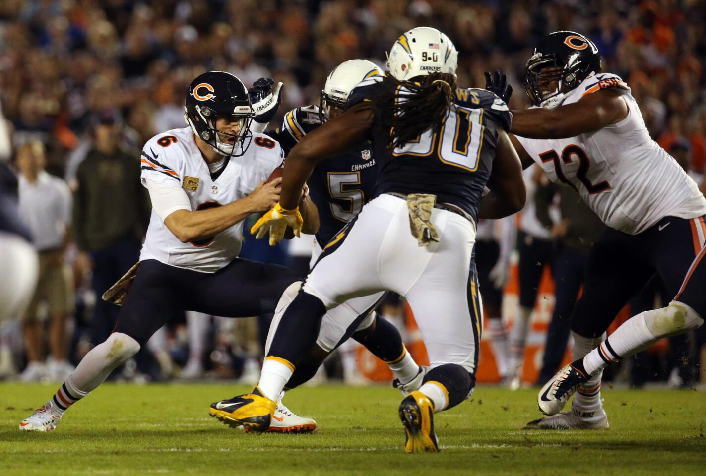 Jay Cutler is sacked by the Chargers defense and fumbles in the first quarter.