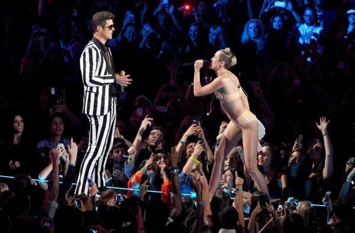 Miley Cyrus' provocative performance with Robin Thicke at the MTV Video Music Awards inspired one of the most popular Halloween costumes this year.