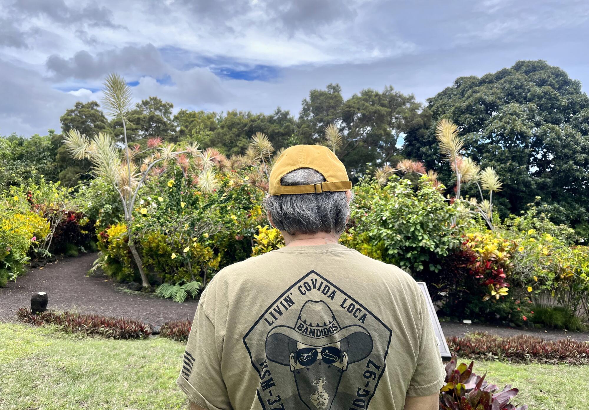 Jon Lomberg surveys the Galaxy Garden at Paleaku Gardens Peace Sanctuary in Captain Cook, Hawaii.