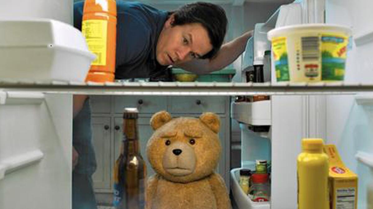 John (Mark Wahlberg) and Ted (voiced by Seth MacFarlane) keep their friendship going through life changes in “Ted 2.”