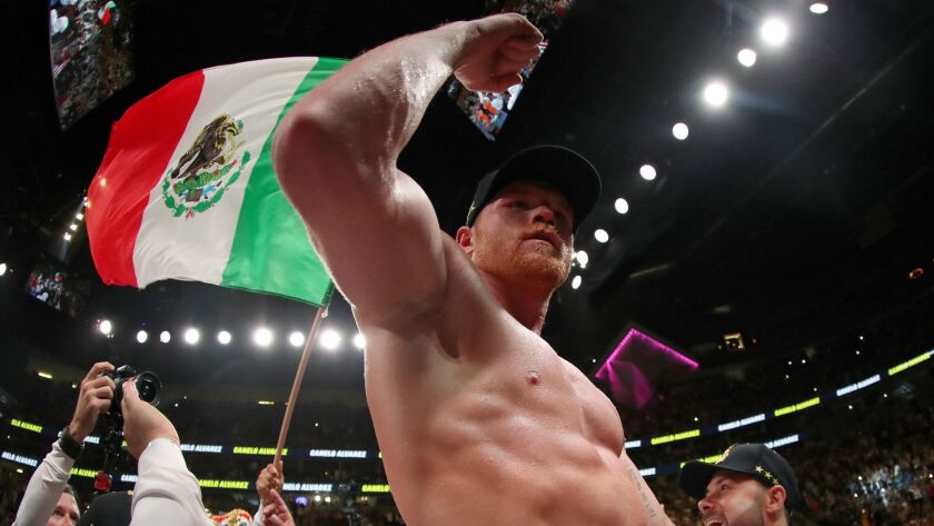 Canelo Alvarez celebrates after his unanimous decision win over Daniel Jacobs in their middleweight unification fight at T-Mobile Arena on May 04, 2019 in Las Vegas.