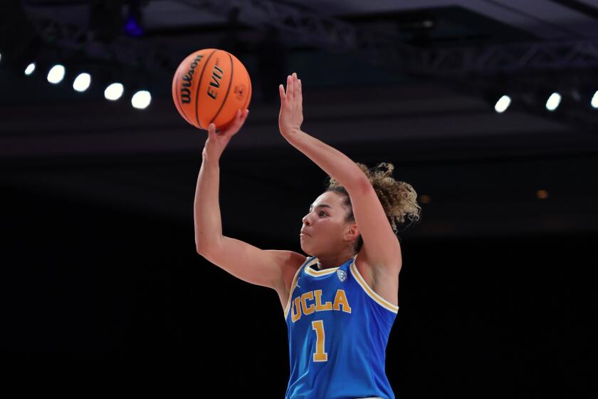 UCLA guard Kiki Rice shoots against Tennessee during the Battle 4 Atlantis tournament