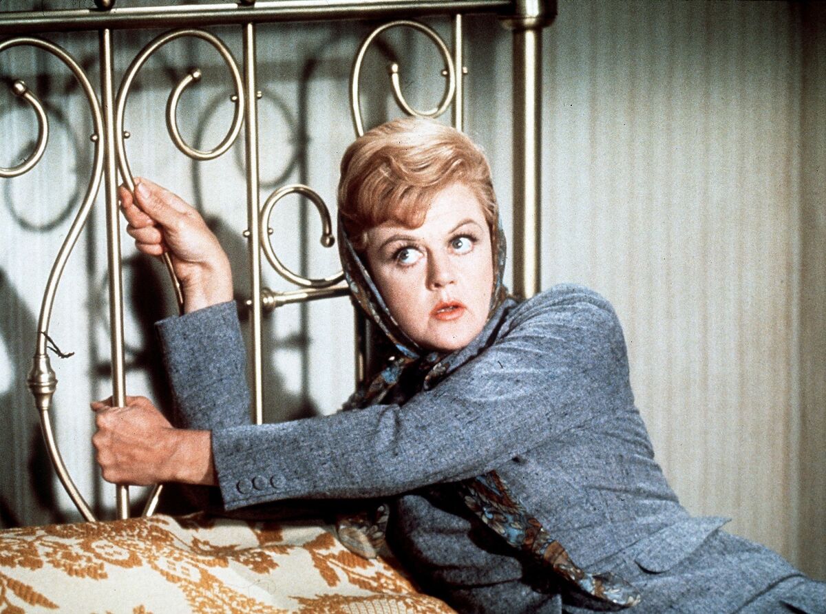 Angela Lansbury on a brass bed in "Bedknobs and Broomsticks." (1971)